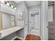Well-lit bathroom with a vanity area, and entry to the toilet at 3655 Habersham Ne Rd # 244B, Atlanta, GA 30305
