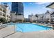 This inviting pool has ample seating and lounging areas in the community, perfect for relaxation and recreation at 3655 Habersham Ne Rd # 244B, Atlanta, GA 30305
