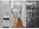 Entryway with coat closet, wood floors and stainless steel dishwasher at 3655 Habersham Ne Rd # 244B, Atlanta, GA 30305