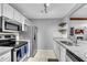 Spacious kitchen featuring stainless steel appliances, granite countertops and a view to the living room at 3655 Habersham Ne Rd # 244B, Atlanta, GA 30305
