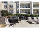 This outdoor patio includes seating and grills, perfect for gatherings or relaxing in a landscaped setting at 3655 Habersham Ne Rd # 244B, Atlanta, GA 30305