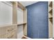 Walk-in closet featuring built-in shelving units and drawers, providing ample storage at 3655 Habersham Ne Rd # 244B, Atlanta, GA 30305
