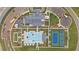 Aerial view of the community clubhouse, pool, tennis courts, and other recreational facilities at 438 Southland Cir, Canton, GA 30115