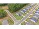 A captivating aerial view of a home with a neatly manicured lawn and a fenced backyard in a suburban neighborhood at 438 Southland Cir, Canton, GA 30115