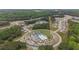 Aerial view of the new home community showcasing resort-style amenities and a wooded landscape at 438 Southland Cir, Canton, GA 30115
