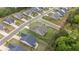 Aerial view of a beautifully landscaped home with a fenced backyard and mature trees in a friendly neighborhood at 438 Southland Cir, Canton, GA 30115