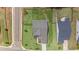 Aerial view showcasing the property's layout, yard, and neighborhood at 438 Southland Cir, Canton, GA 30115