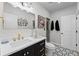 Modern bathroom featuring a vanity, stylish fixtures, and a glass-enclosed shower at 438 Southland Cir, Canton, GA 30115