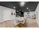 Elegant dining area with stylish table, chairs, and modern lighting at 438 Southland Cir, Canton, GA 30115