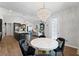Elegant dining area featuring a stylish chandelier and modern decor at 438 Southland Cir, Canton, GA 30115