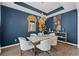 Stylish dining room with an elegant chandelier, marble table, and modern decor at 438 Southland Cir, Canton, GA 30115