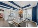 Bright dining room with modern decor, an elegant chandelier, and an inviting atmosphere at 438 Southland Cir, Canton, GA 30115
