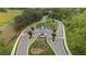 Aerial view of a gated community entrance, showcasing landscaping and access control for enhanced privacy and security at 438 Southland Cir, Canton, GA 30115