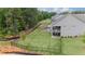 Picture of the home with a sprawling fenced backyard and a covered patio perfect for relaxing at 438 Southland Cir, Canton, GA 30115