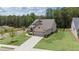 Beautiful single-Gathering home with a lush green lawn and a two-car garage in a suburban setting at 438 Southland Cir, Canton, GA 30115