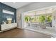 Bright living room with sliding doors leading to an outdoor patio, great for entertaining at 438 Southland Cir, Canton, GA 30115