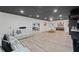Open-concept living area featuring a bar, game room, and comfortable seating at 438 Southland Cir, Canton, GA 30115