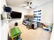 Bedroom with bunk beds, ceiling fan, and large television at 7860 Bristol Valley Dr, Cumming, GA 30028