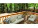 Inviting outdoor deck featuring comfortable seating amidst a lush green backdrop, perfect for relaxation at 1241 Bethsaida Rd, Riverdale, GA 30296