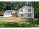 Charming two-story home with white siding, dark shutters, and a well-maintained lawn at 1241 Bethsaida Rd, Riverdale, GA 30296