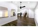 Open concept living space with hardwood floors, vaulted ceiling, and easy access to the kitchen area at 1241 Bethsaida Rd, Riverdale, GA 30296