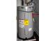 Close up of a modern AO Smith water heater with an Energy Guide sticker at 1241 Bethsaida Rd, Riverdale, GA 30296