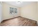 Bedroom with natural light and wood-look flooring at 26 Alisha Nw Cir, Cartersville, GA 30121