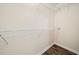Walk-in closet featuring metal shelving and wood-look floors at 26 Alisha Nw Cir, Cartersville, GA 30121