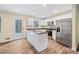 Bright kitchen with white cabinets, stainless steel appliances, and granite countertops at 26 Alisha Nw Cir, Cartersville, GA 30121