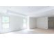 Bright bedroom featuring modern ceiling, trim and plenty of light at 4222 Matisse Ln, Fairburn, GA 30213