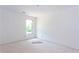 View of a unfinished bedroom with baseboards and large window at 4222 Matisse Ln, Fairburn, GA 30213
