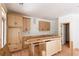 Kitchen featuring light wood cabinets and hardwood flooring at 4222 Matisse Ln, Fairburn, GA 30213