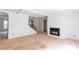 Spacious living room featuring hardwood floors, a fireplace, and a staircase at 4222 Matisse Ln, Fairburn, GA 30213