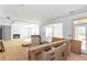 Open-concept living room featuring coffered ceilings, fireplace and hardwood floors at 4222 Matisse Ln, Fairburn, GA 30213