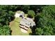 Aerial view showing the house, extra garage and back deck at 116 Woolsey Creek Trl, Fayetteville, GA 30215