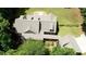 Aerial view of the home showcasing the roof, landscaping, and connection to a separate building at 116 Woolsey Creek Trl, Fayetteville, GA 30215