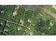 Aerial view of property lines for a wooded residential lot near a lake in Fayetteville, GA at 116 Woolsey Creek Trl, Fayetteville, GA 30215
