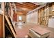 Spacious unfinished basement with exposed wood ceiling and ductwork offers customization potential at 116 Woolsey Creek Trl, Fayetteville, GA 30215