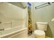 A full bathroom features a white tub-shower combo and a toilet at 116 Woolsey Creek Trl, Fayetteville, GA 30215