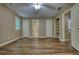 Spacious bedroom with hardwood floors, ceiling fan and closet space at 116 Woolsey Creek Trl, Fayetteville, GA 30215