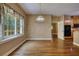 Bright dining room featuring a large window with a view, perfect for entertaining guests at 116 Woolsey Creek Trl, Fayetteville, GA 30215