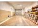 Large garage interior with an insulated garage door and workbench area, ideal for projects and storage at 116 Woolsey Creek Trl, Fayetteville, GA 30215