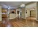 Bright and airy living space with hardwood floors and seamless access to the kitchen and other living areas at 116 Woolsey Creek Trl, Fayetteville, GA 30215