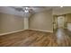 Spacious living area with hardwood floors and a ceiling fan, perfect for Gathering gatherings at 116 Woolsey Creek Trl, Fayetteville, GA 30215