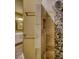 Luxurious stone shower with rainfall showerhead and pebble accents at 116 Woolsey Creek Trl, Fayetteville, GA 30215