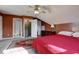 Charming bedroom with angled ceilings, classic dresser, and adjoining bathroom at 121 St Albans Way, Peachtree City, GA 30269