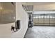 Interior garage shot shows EV charging station and ample storage options at 121 St Albans Way, Peachtree City, GA 30269
