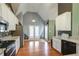 Well-lit kitchen featuring granite countertops, stainless appliances and hardwood flooring at 121 St Albans Way, Peachtree City, GA 30269