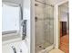 Relaxing bathroom showcasing a shower and tub, complete with a window and stylish tile at 121 St Albans Way, Peachtree City, GA 30269
