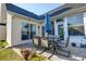 Inviting patio with table and chairs offers an ideal spot for entertaining at 121 St Albans Way, Peachtree City, GA 30269